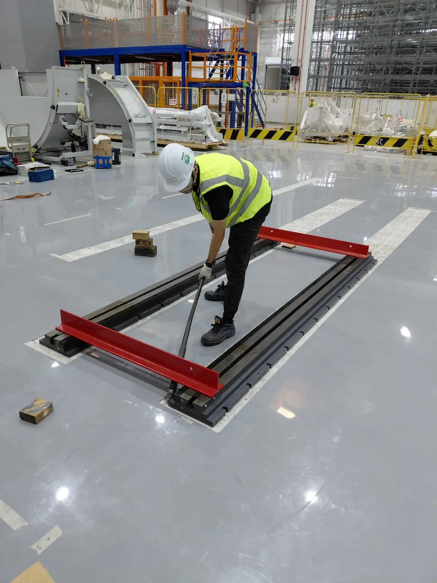 HSR engineer working on industrial equipment