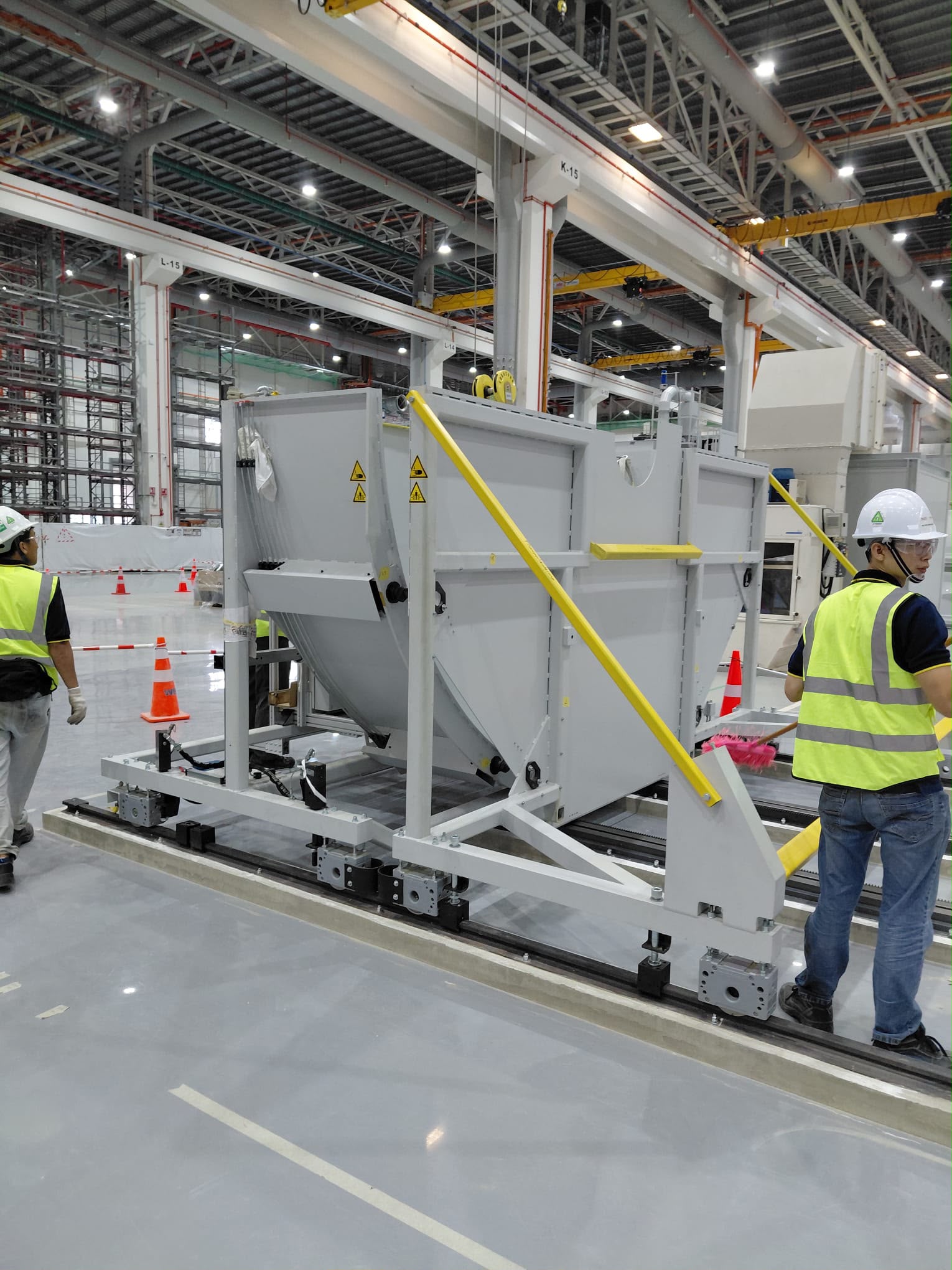 HSR engineer working on industrial equipment